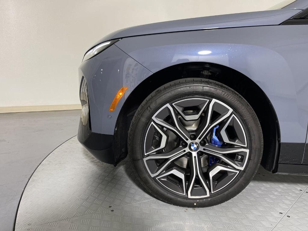 new 2025 BMW iX car, priced at $104,340