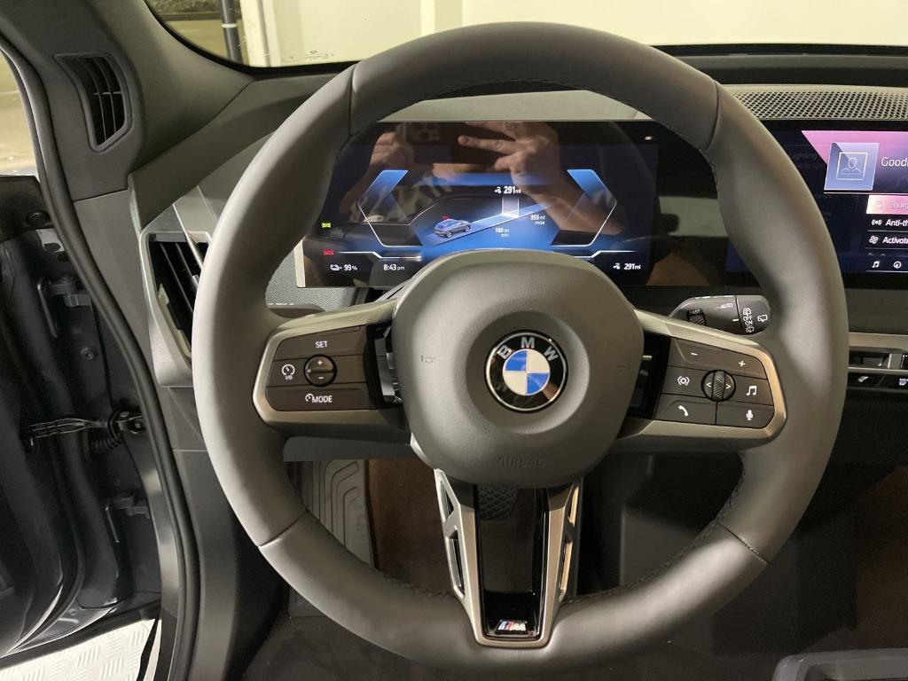 new 2025 BMW iX car, priced at $104,340