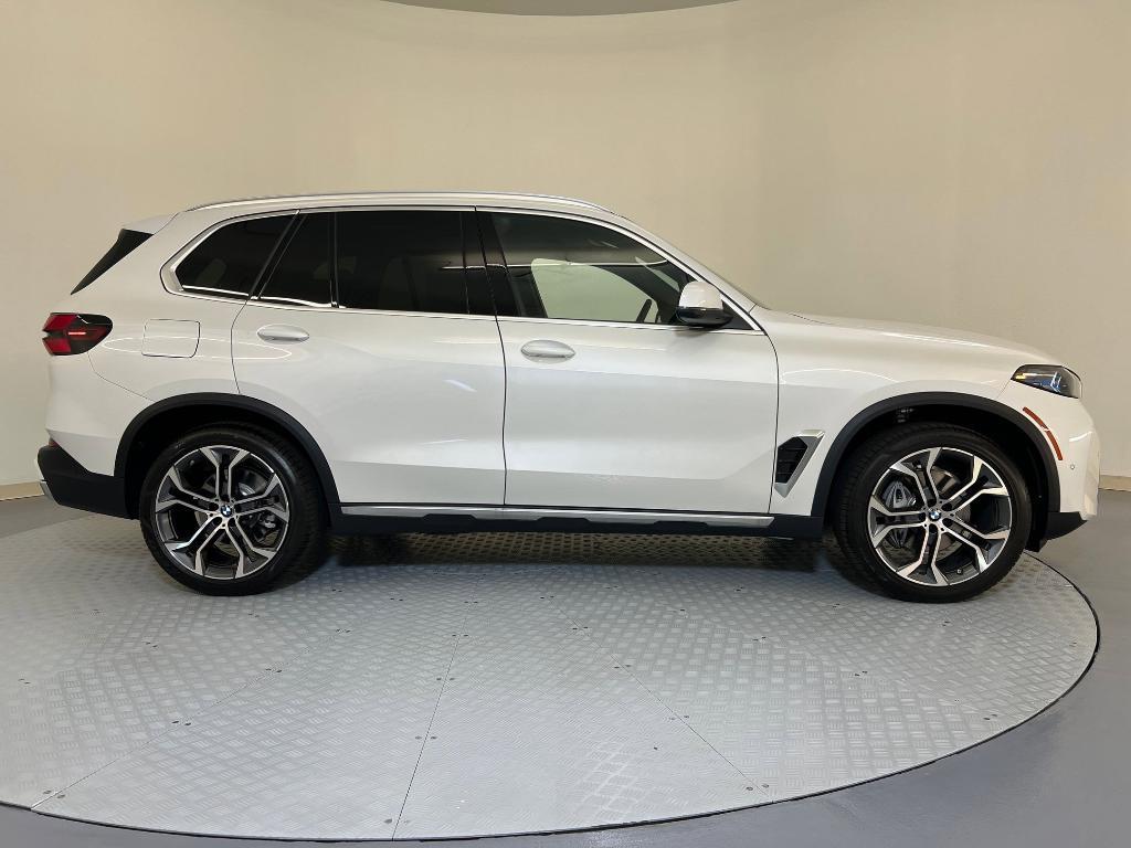 new 2026 BMW X5 car, priced at $75,000