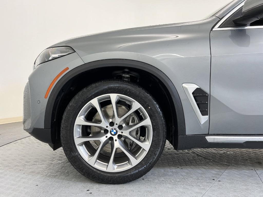 used 2024 BMW X5 car, priced at $59,021