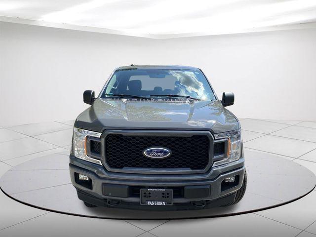 used 2018 Ford F-150 car, priced at $25,188