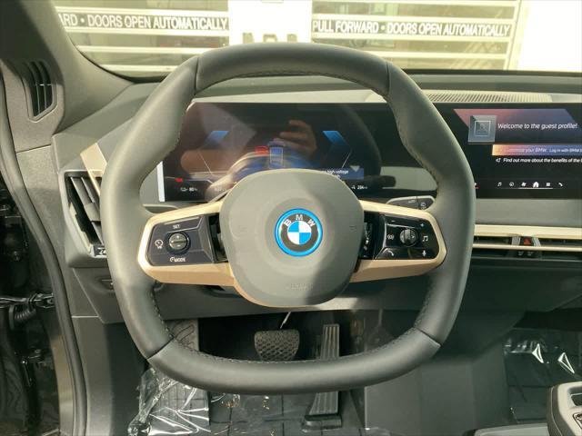 new 2024 BMW iX car, priced at $96,070