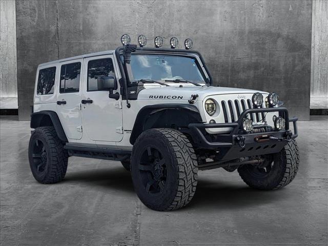 used 2016 Jeep Wrangler Unlimited car, priced at $21,498