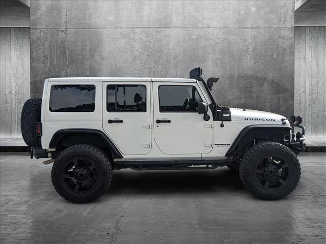 used 2016 Jeep Wrangler Unlimited car, priced at $21,498