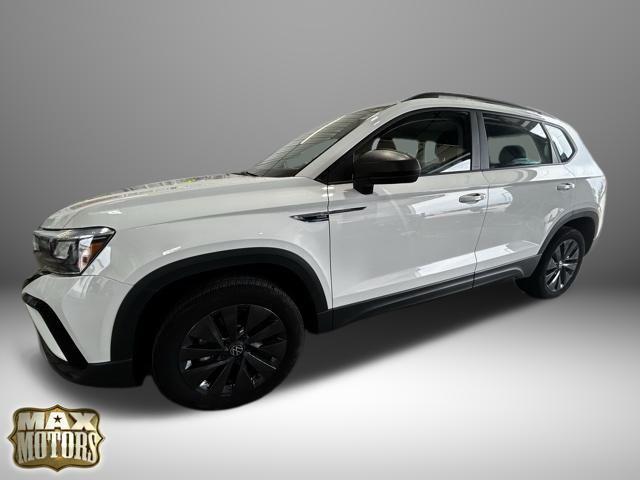 used 2023 Volkswagen Taos car, priced at $21,206