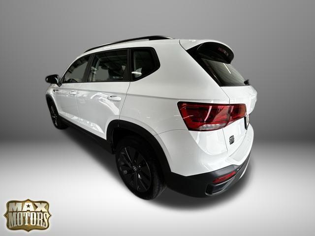 used 2023 Volkswagen Taos car, priced at $21,206