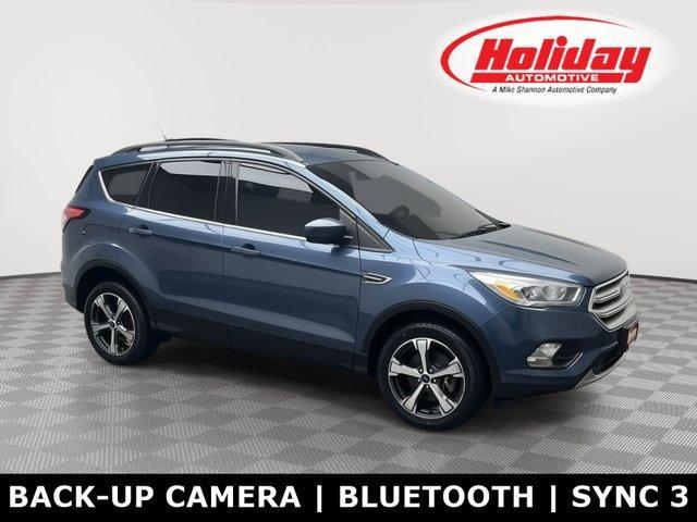 used 2018 Ford Escape car, priced at $12,995