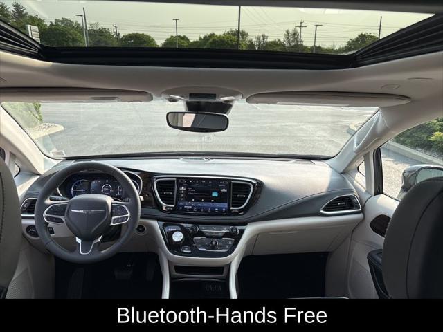 used 2023 Chrysler Pacifica Hybrid car, priced at $36,257