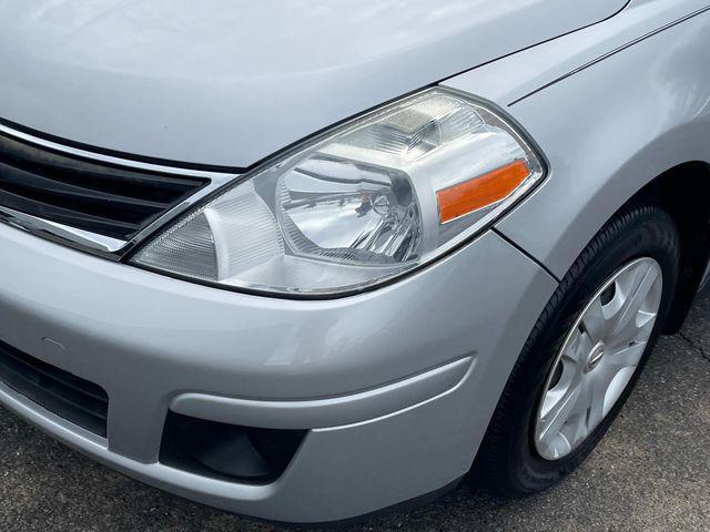 used 2011 Nissan Versa car, priced at $5,000