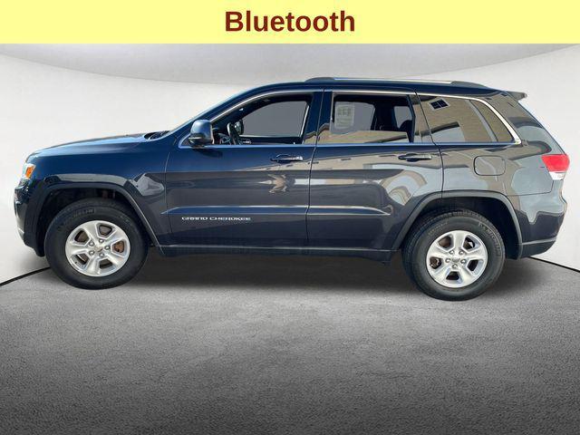 used 2014 Jeep Grand Cherokee car, priced at $12,401