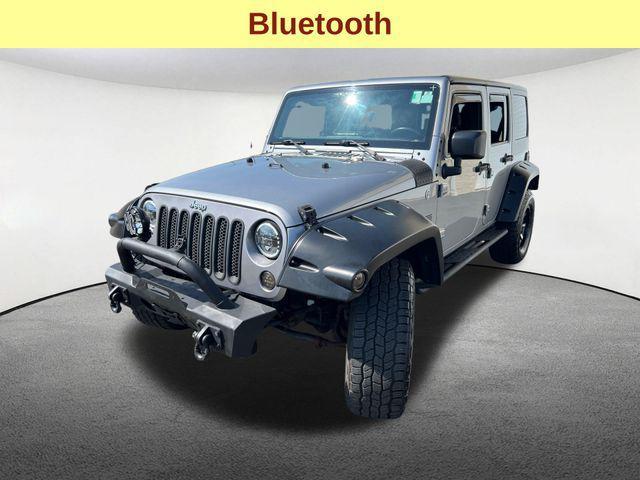 used 2015 Jeep Wrangler Unlimited car, priced at $20,977