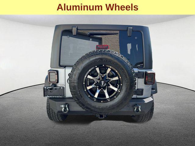 used 2015 Jeep Wrangler Unlimited car, priced at $20,977