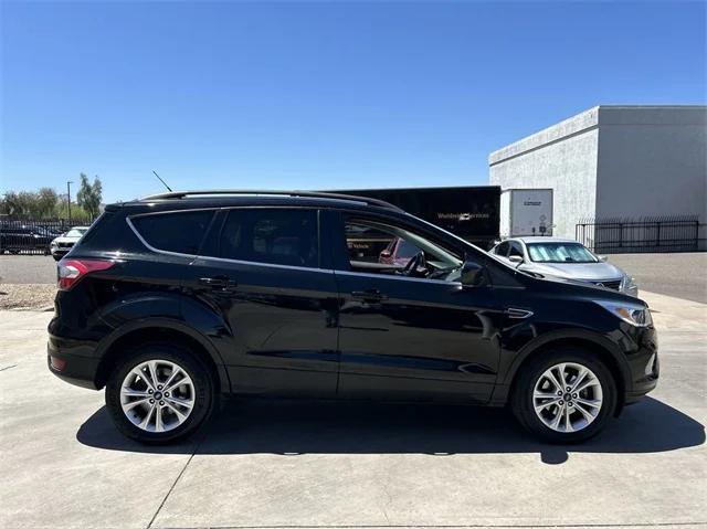 used 2018 Ford Escape car, priced at $11,888