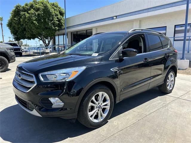 used 2018 Ford Escape car, priced at $11,888