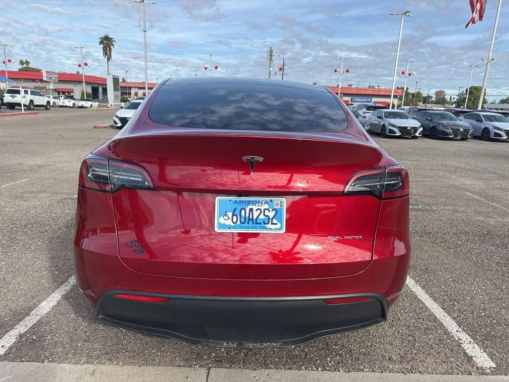 used 2025 Tesla Model Y car, priced at $36,999