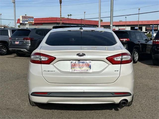 used 2016 Ford Fusion car, priced at $7,988