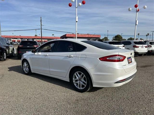 used 2016 Ford Fusion car, priced at $7,988