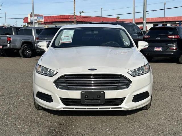 used 2016 Ford Fusion car, priced at $7,988