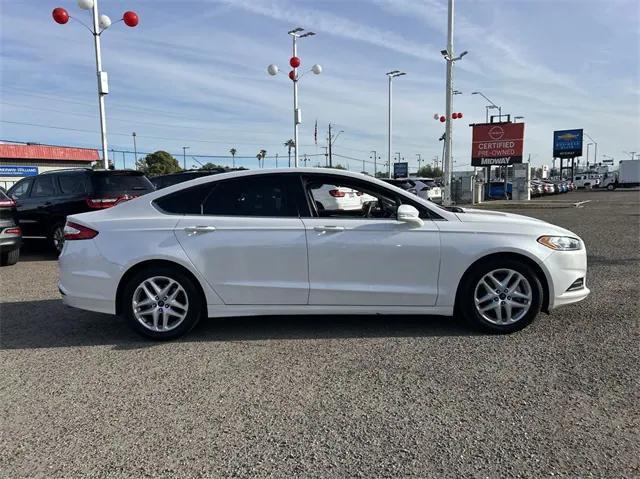 used 2016 Ford Fusion car, priced at $7,988