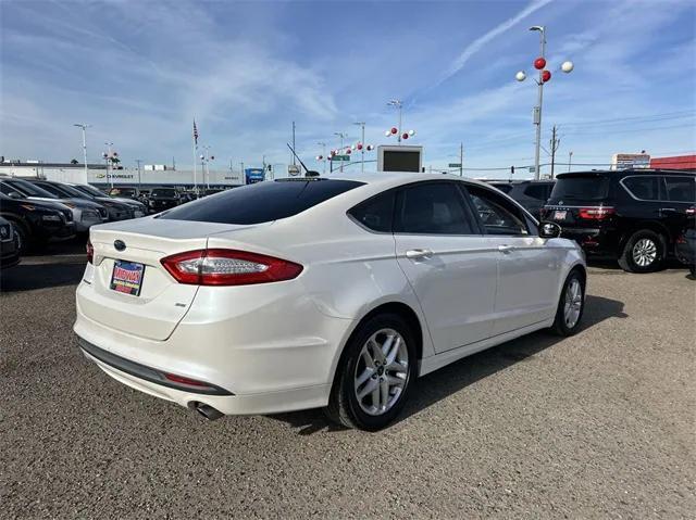 used 2016 Ford Fusion car, priced at $7,988