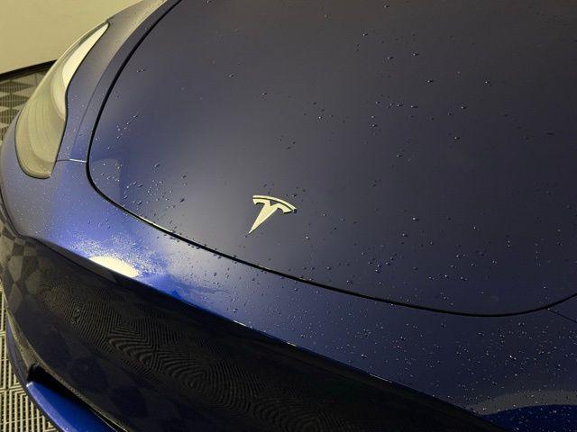 used 2023 Tesla Model Y car, priced at $30,900