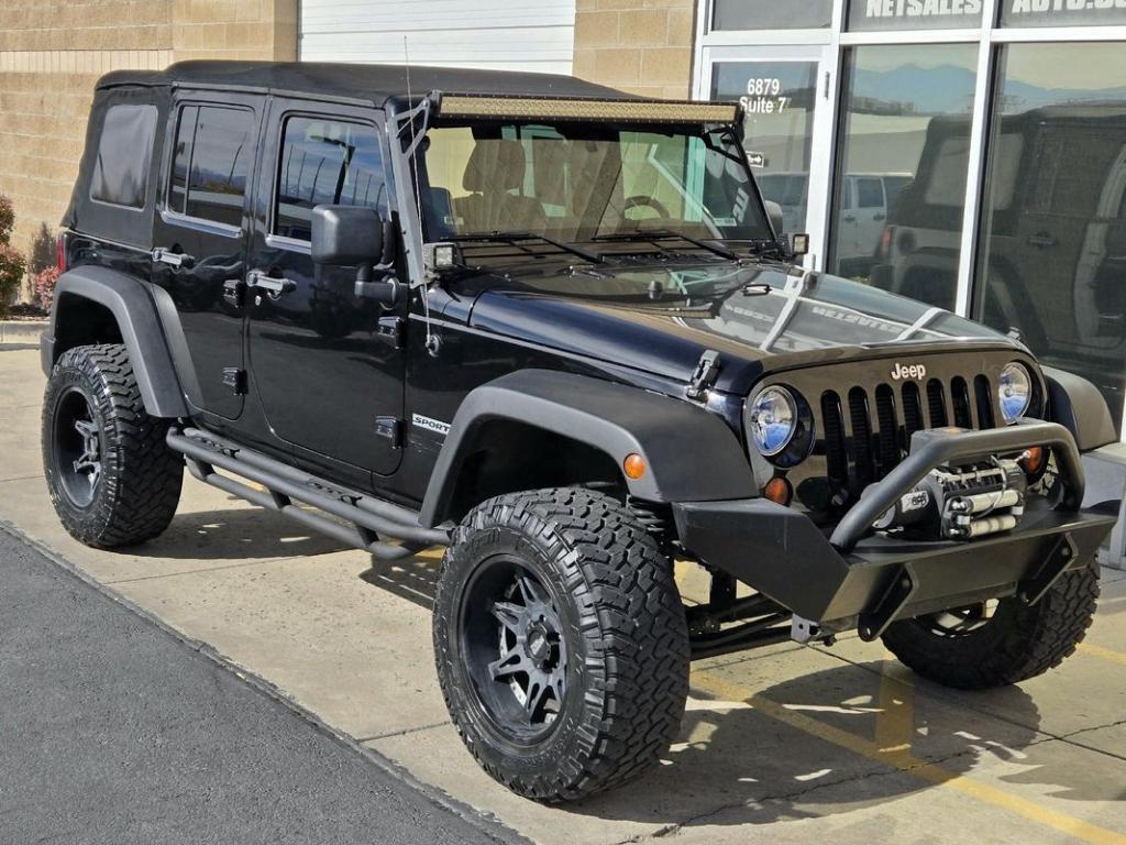 used 2012 Jeep Wrangler Unlimited car, priced at $18,995