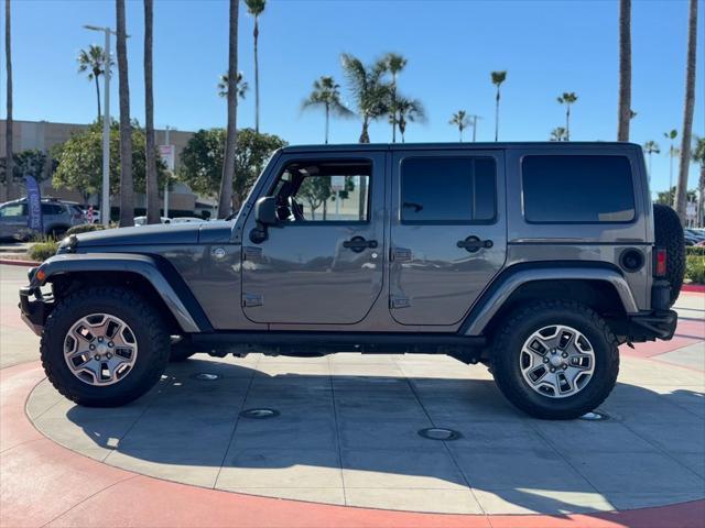 used 2014 Jeep Wrangler Unlimited car, priced at $22,988