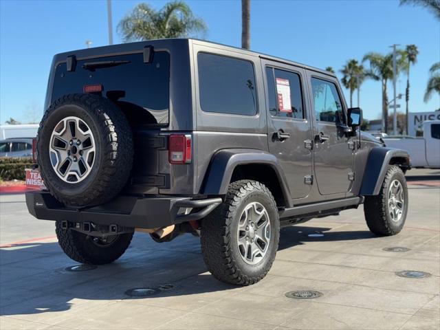 used 2014 Jeep Wrangler Unlimited car, priced at $22,988