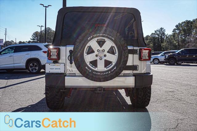 used 2012 Jeep Wrangler Unlimited car, priced at $13,999