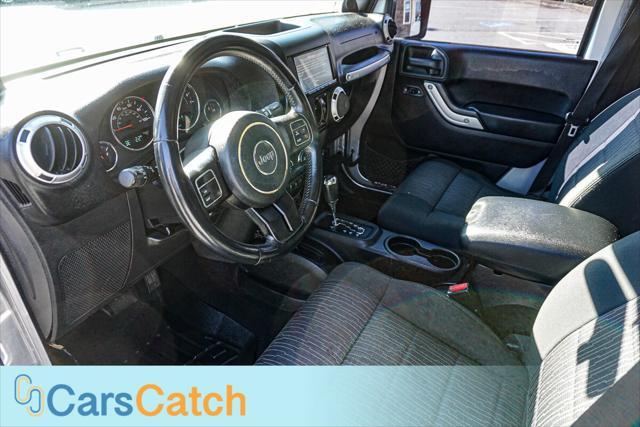 used 2012 Jeep Wrangler Unlimited car, priced at $13,999