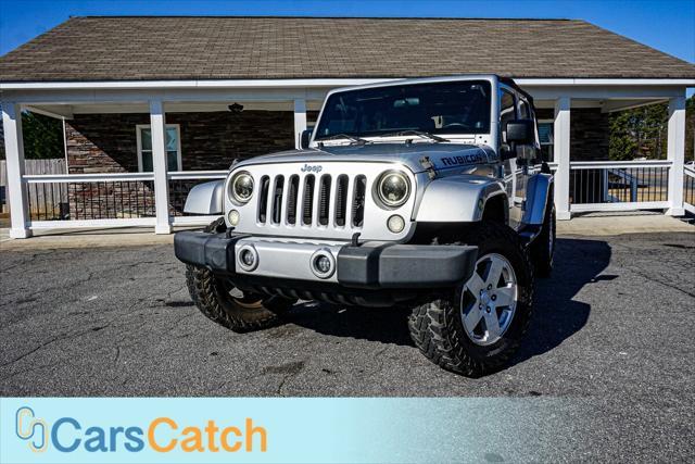 used 2012 Jeep Wrangler Unlimited car, priced at $13,999