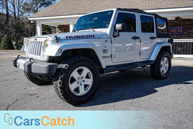 used 2012 Jeep Wrangler Unlimited car, priced at $13,999