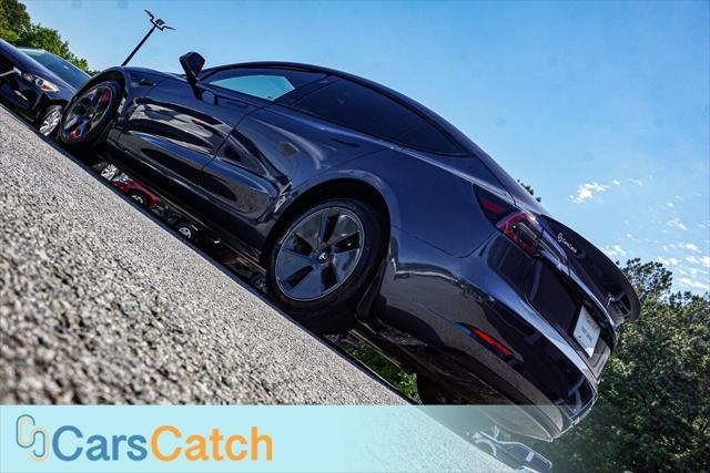 used 2023 Tesla Model 3 car, priced at $22,999