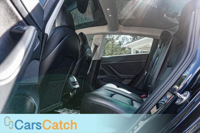 used 2021 Tesla Model 3 car, priced at $17,500