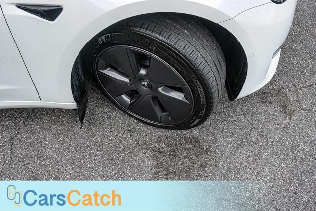 used 2022 Tesla Model 3 car, priced at $19,950