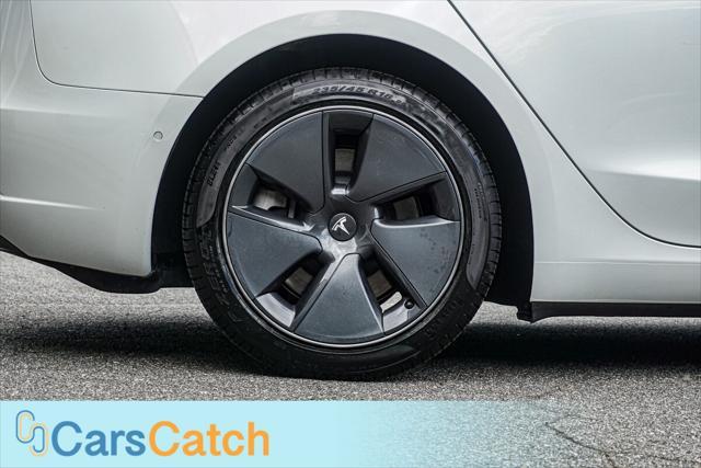 used 2022 Tesla Model 3 car, priced at $19,950