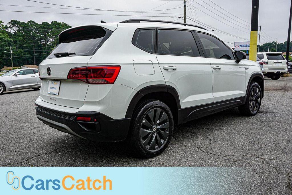 used 2023 Volkswagen Taos car, priced at $15,999
