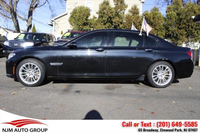 used 2014 BMW 750 car, priced at $15,995