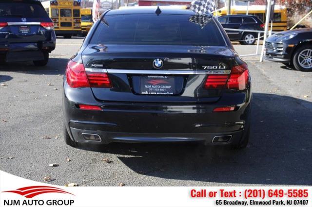 used 2014 BMW 750 car, priced at $15,995