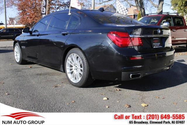 used 2014 BMW 750 car, priced at $15,995