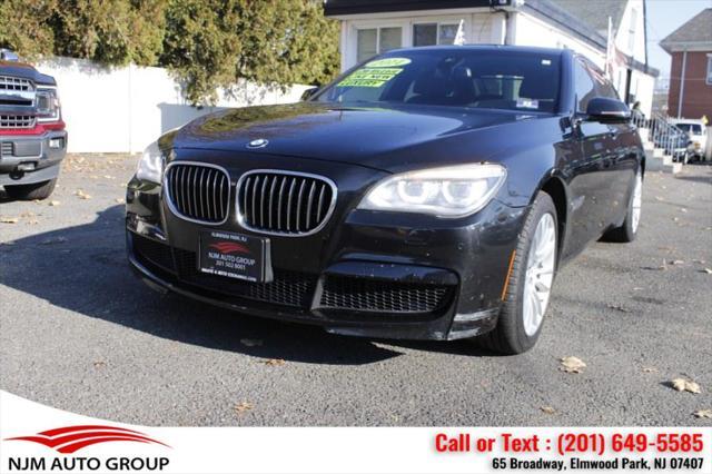 used 2014 BMW 750 car, priced at $15,995