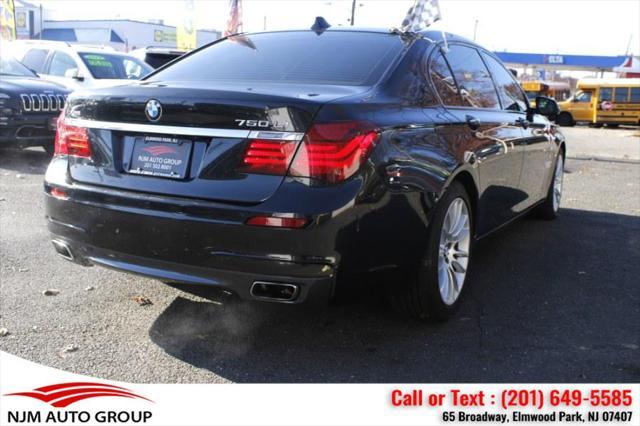 used 2014 BMW 750 car, priced at $15,995