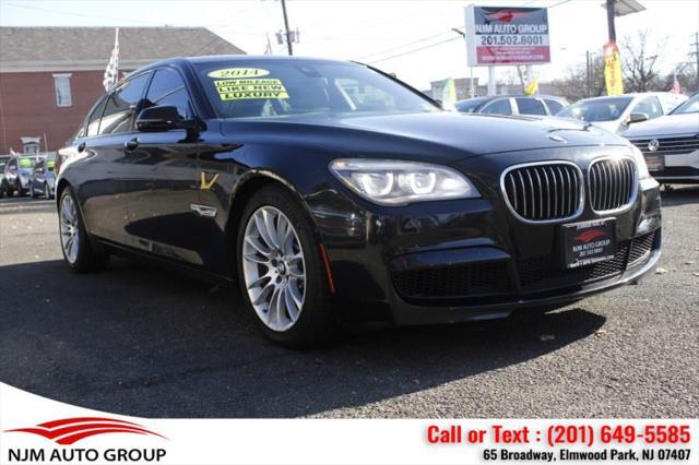 used 2014 BMW 750 car, priced at $15,995