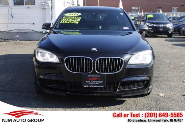 used 2014 BMW 750 car, priced at $15,995