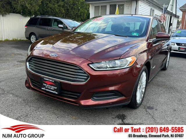 used 2016 Ford Fusion Hybrid car, priced at $8,995