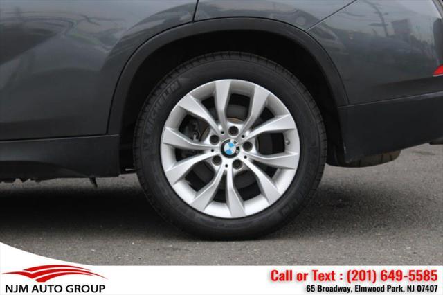 used 2014 BMW X1 car, priced at $9,995