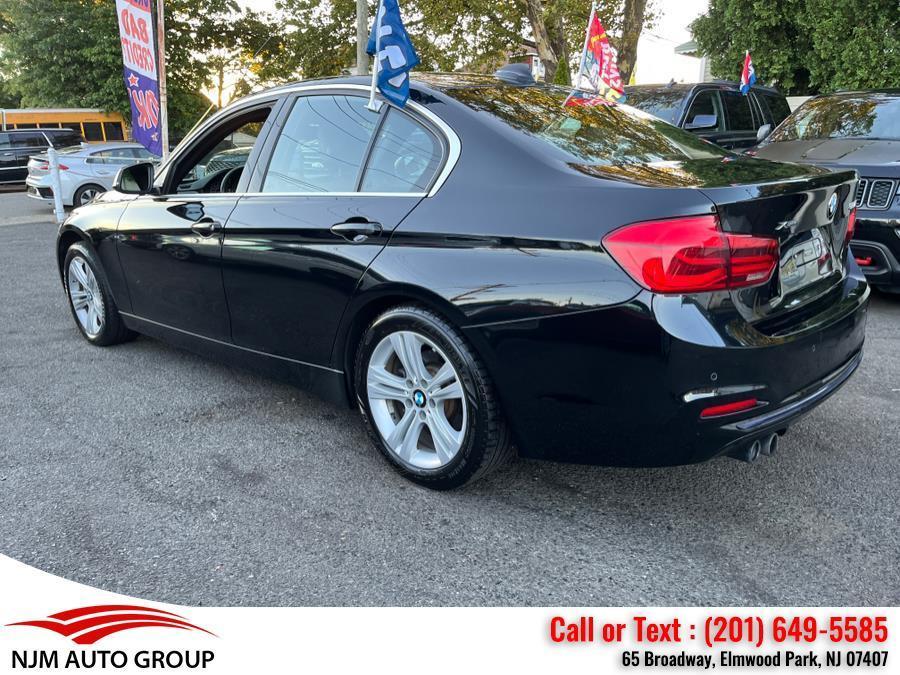 used 2018 BMW 330 car, priced at $17,850