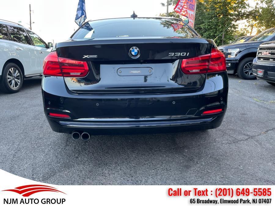 used 2018 BMW 330 car, priced at $17,850