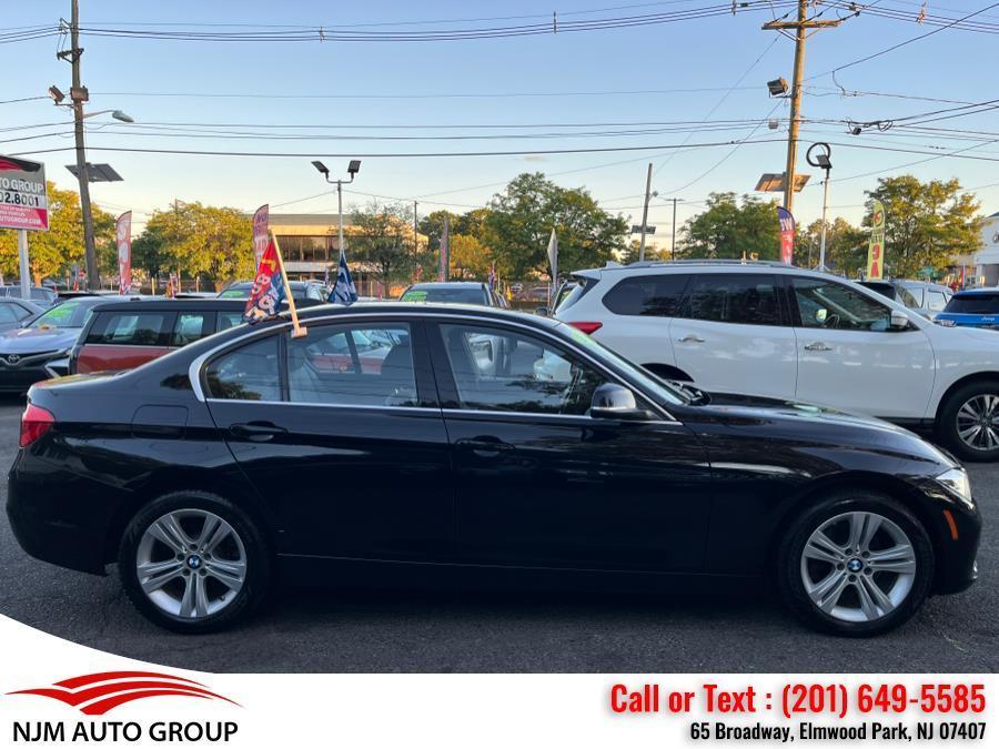 used 2018 BMW 330 car, priced at $17,850