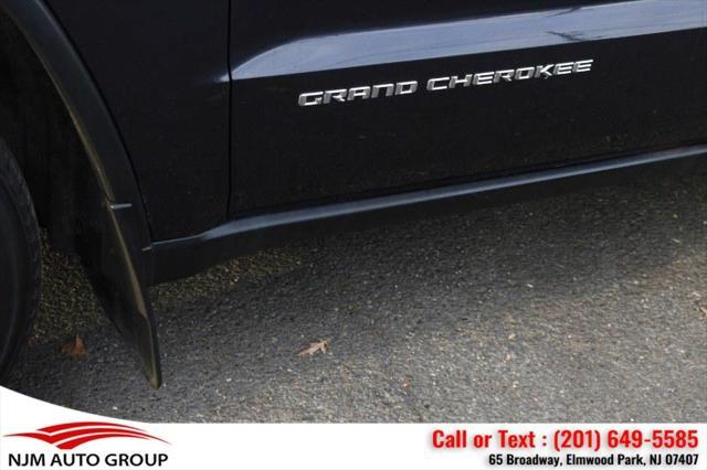 used 2014 Jeep Grand Cherokee car, priced at $11,995